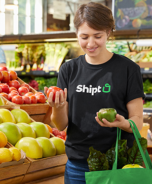 smiling woman while shopping